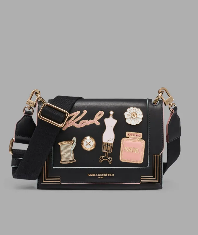 CAMILLE SHOULDER WITH OVERSIZED FASHION PINS sold by Karl Lagerfeld Paris