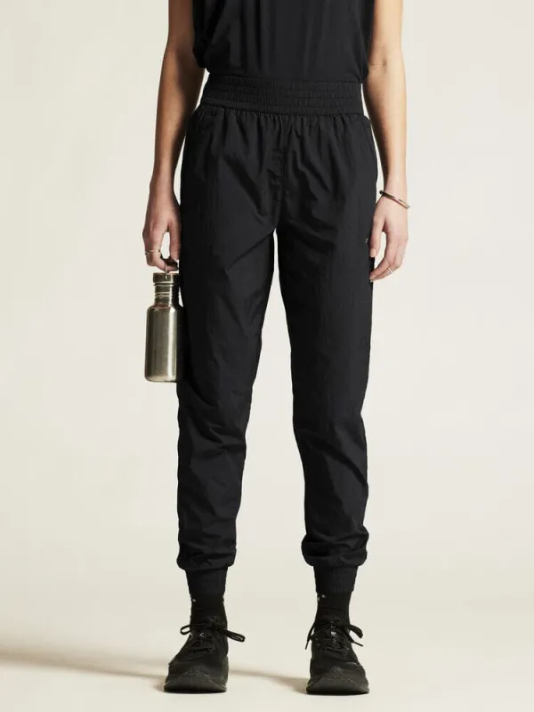 WOMEN'S JOIN WINDPANTS - Black sold by Craft Sportswear