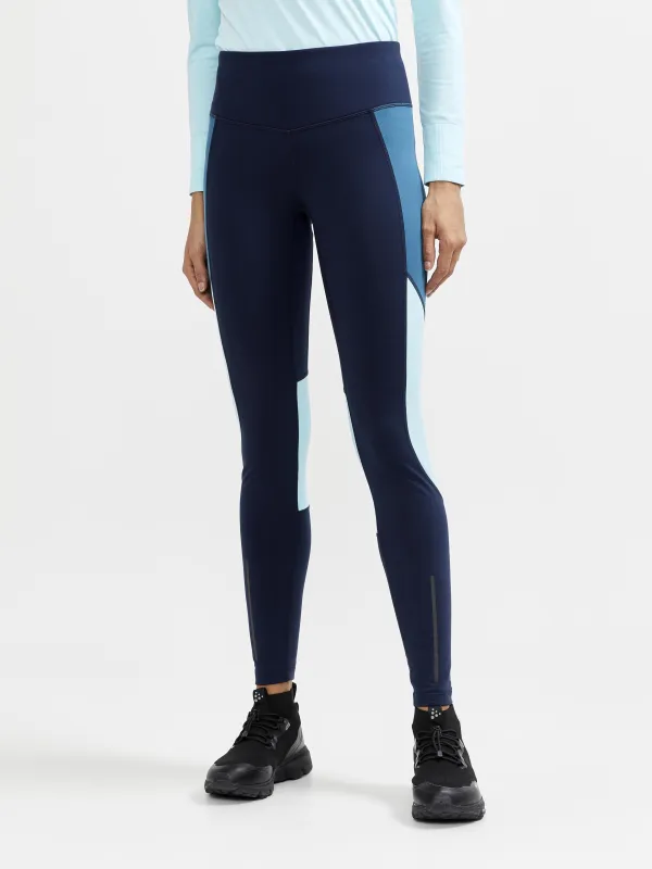 WOMEN'S ADV ESSENCE WARM TIGHTS - BLAZE/UNIVERSE sold by Craft Sportswear