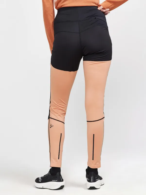 WOMEN'S ADV ESSENCE WIND TIGHTS - BLACK-GLOW sold by Craft Sportswear
