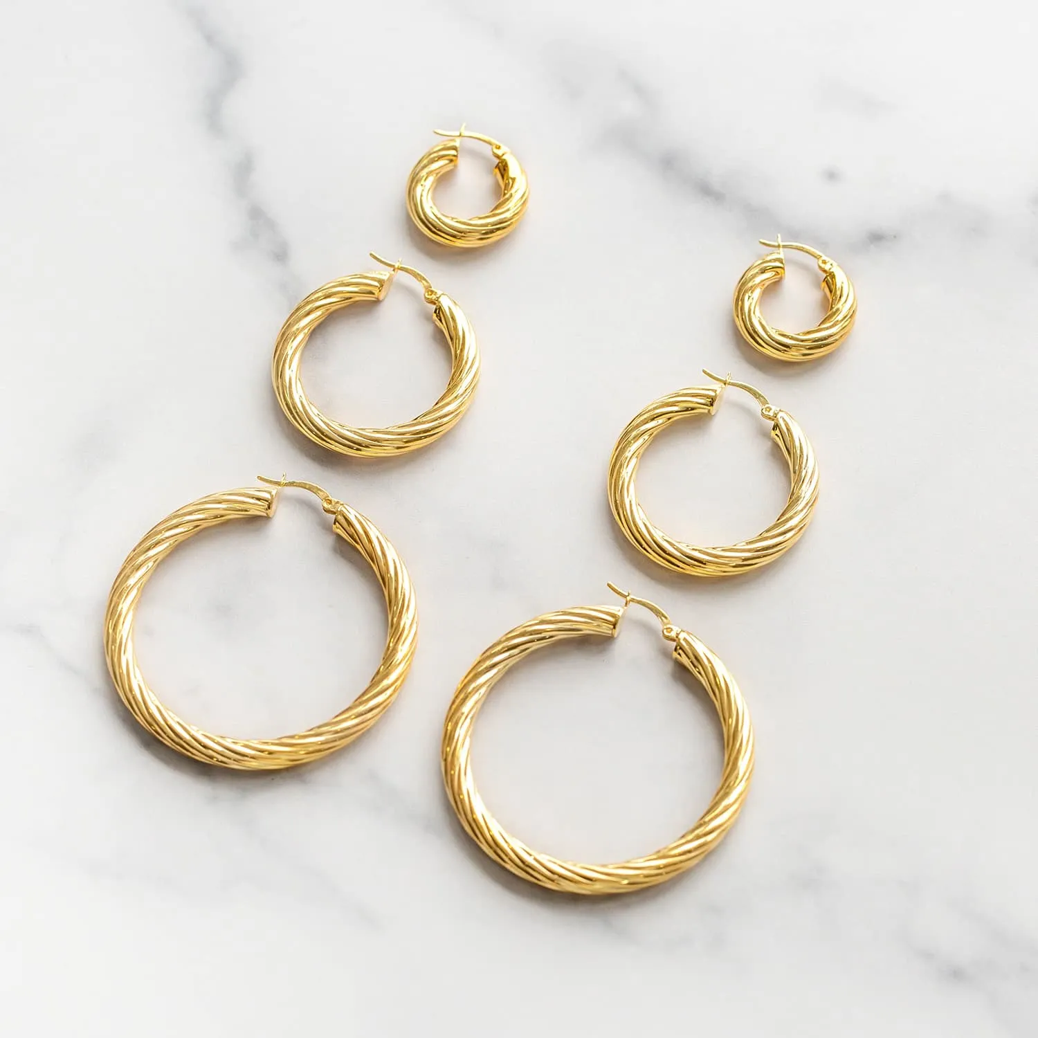 Adina Eden Chunky Hollow Twisted Hoop Earring sold by Adina Eden's product image thumbnail 5