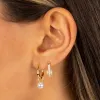 Dangling Pearl Huggie Earring sold by Adina Eden's
