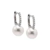 Diamond Oval Shape Pearl Huggie Earring 14K sold by Adina Eden's