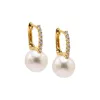Diamond Oval Shape Pearl Huggie Earring 14K sold by Adina Eden's