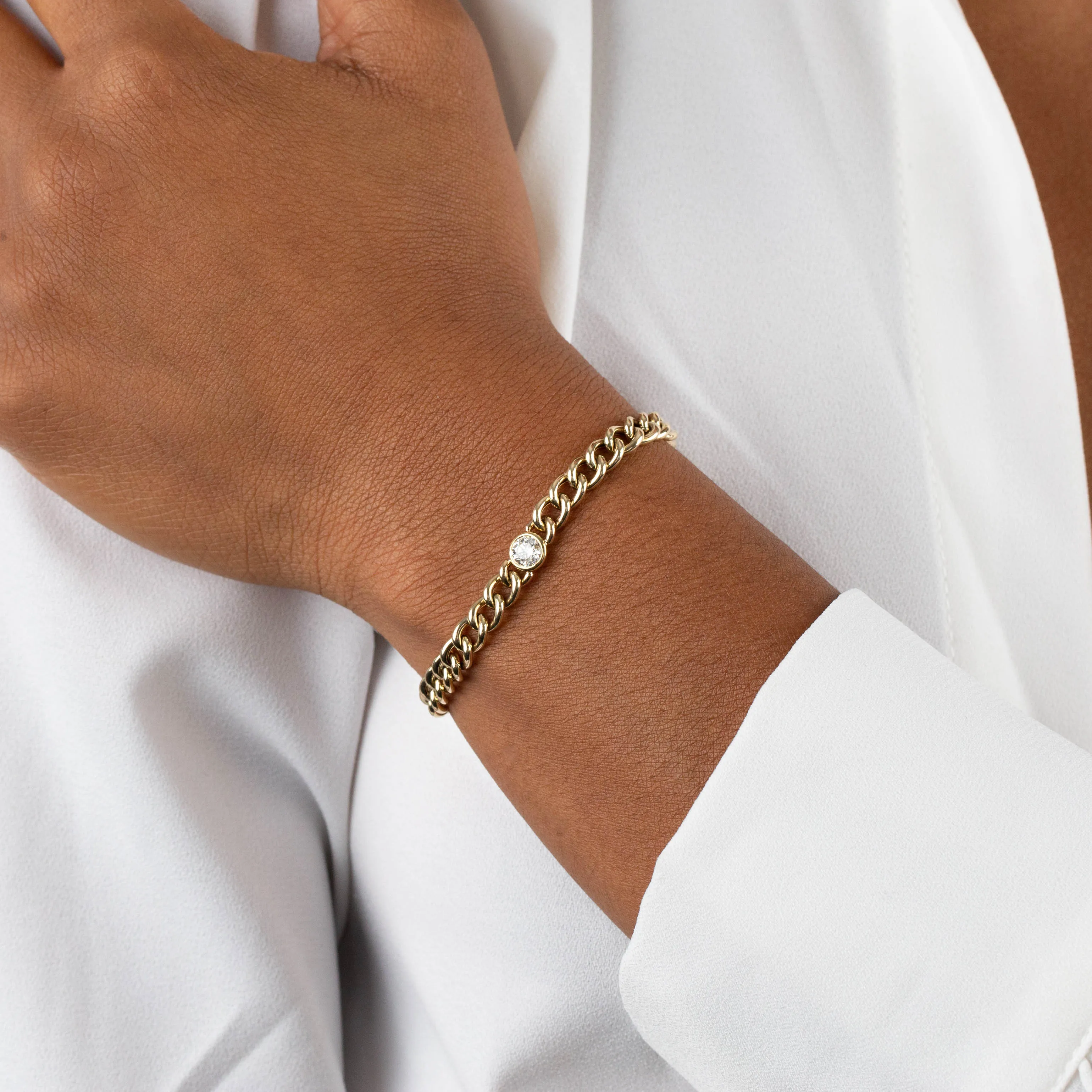 Diamond Bezel X Cuban Link Bracelet 14K sold by Adina Eden's product image thumbnail 2