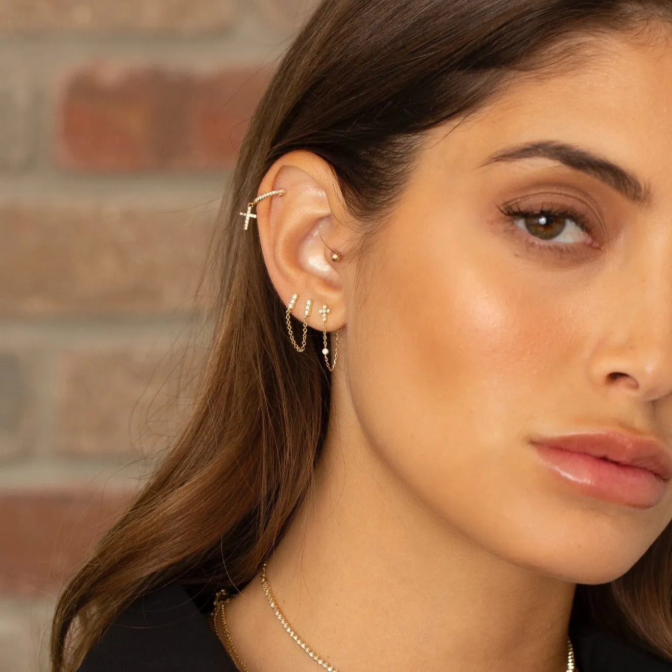 Diamond Pavé Dangling Cross Huggie Earring 14K sold by Adina Eden's product image thumbnail 3