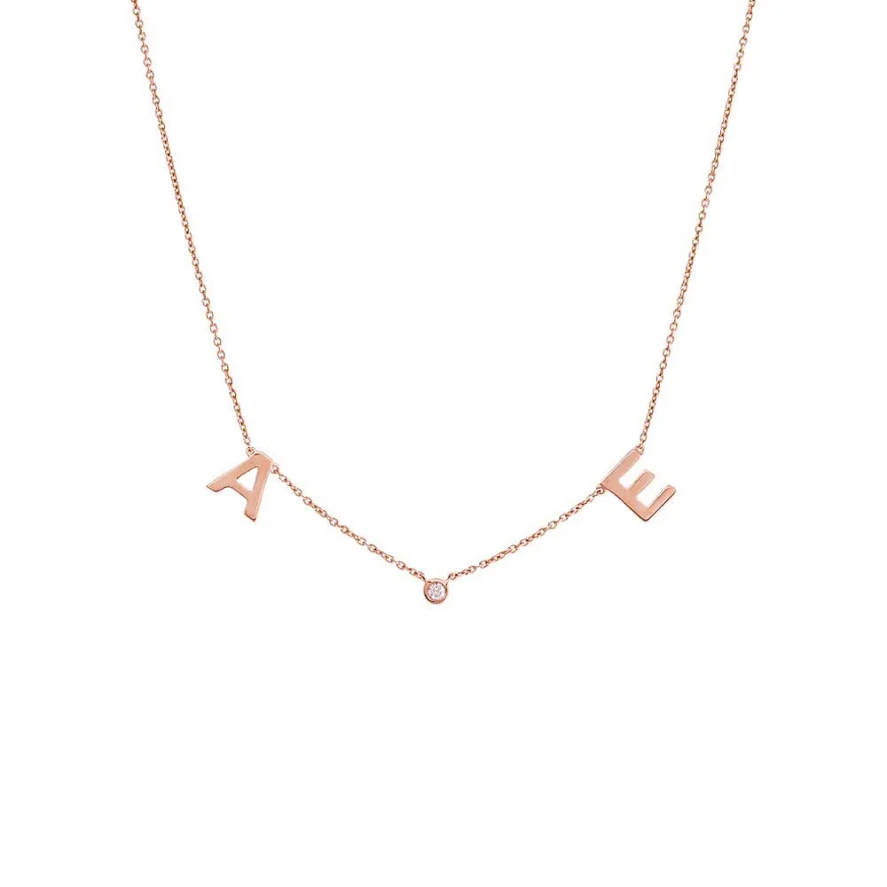 Solid Initial X Diamond Bezel Necklace 14K sold by Adina Eden's product image thumbnail 5