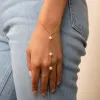 Pearl Handchain Bracelet sold by Adina Eden's