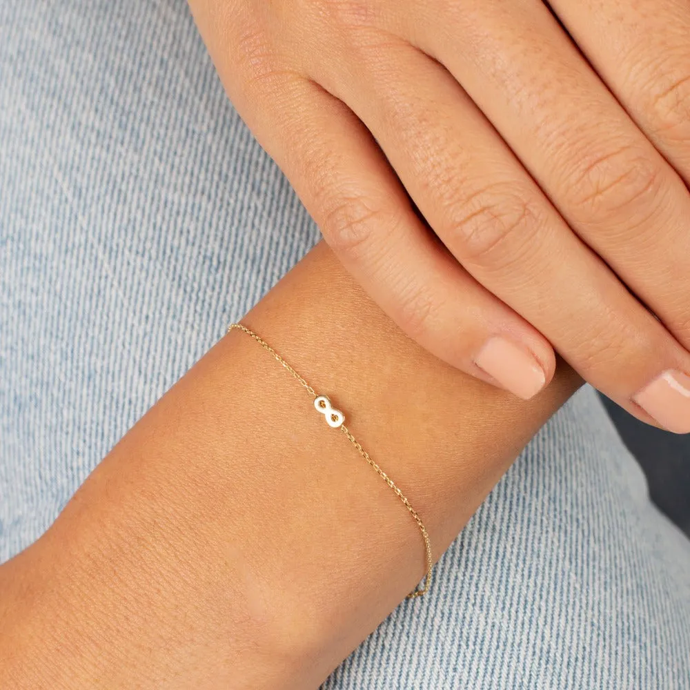 Tiny Solid Infinity Bracelet 14K sold by Adina Eden's product image thumbnail 2