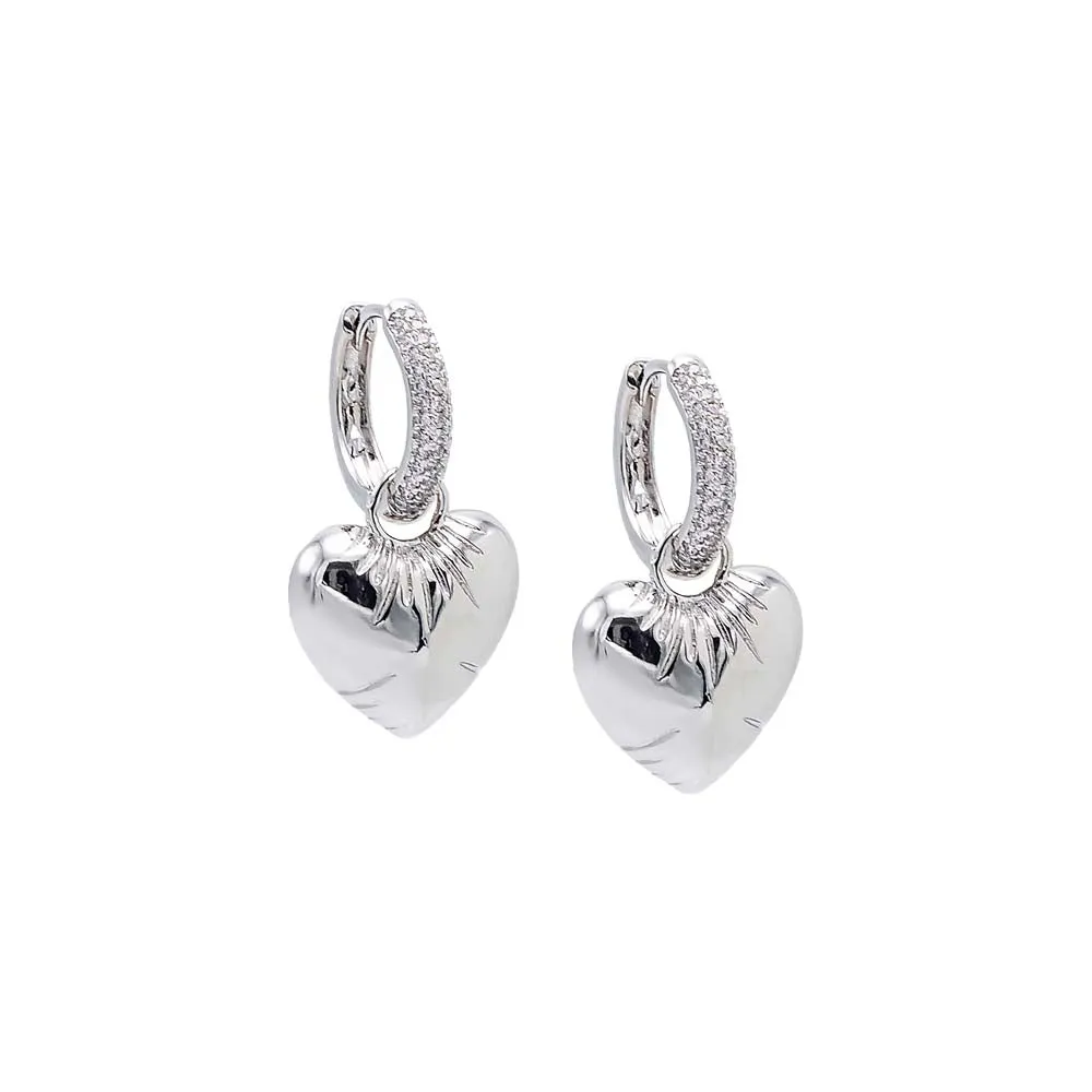 Pave Dangling Puffy Heart Huggie Earring sold by Adina Eden's