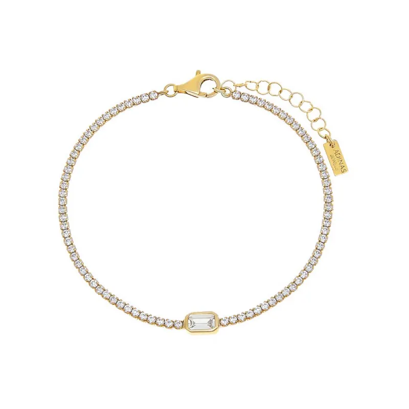 Emerald Bezel Thin Tennis Bracelet sold by Adina Eden's