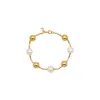 Multi Ball X Pearl Bracelet sold by Adina Eden's