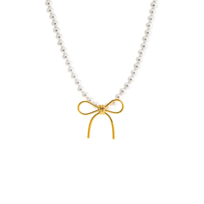 Pearl X Solid Bow Tie Necklace sold by Adina Eden's