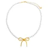 Pearl X Solid Bow Tie Necklace sold by Adina Eden's
