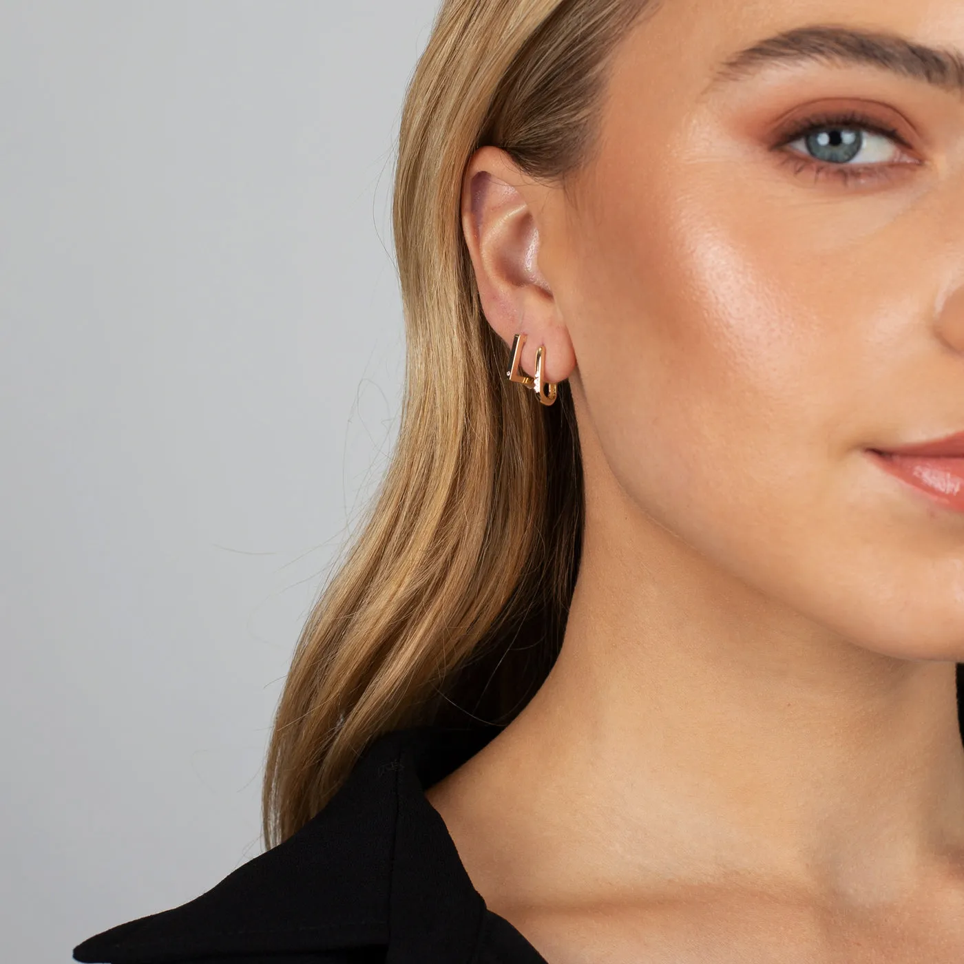 Triple Diamond Oval Huggie Earring 14K sold by Adina Eden's product image thumbnail 4