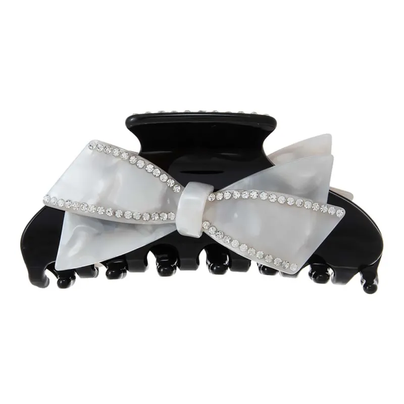 White & Black Bow Medium Claw Clip sold by Adina Eden's