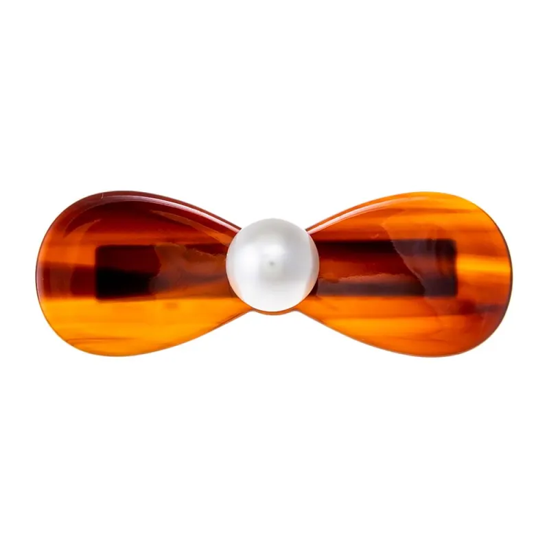 Pearl Curved Bow Hair Barrette sold by Adina Eden's