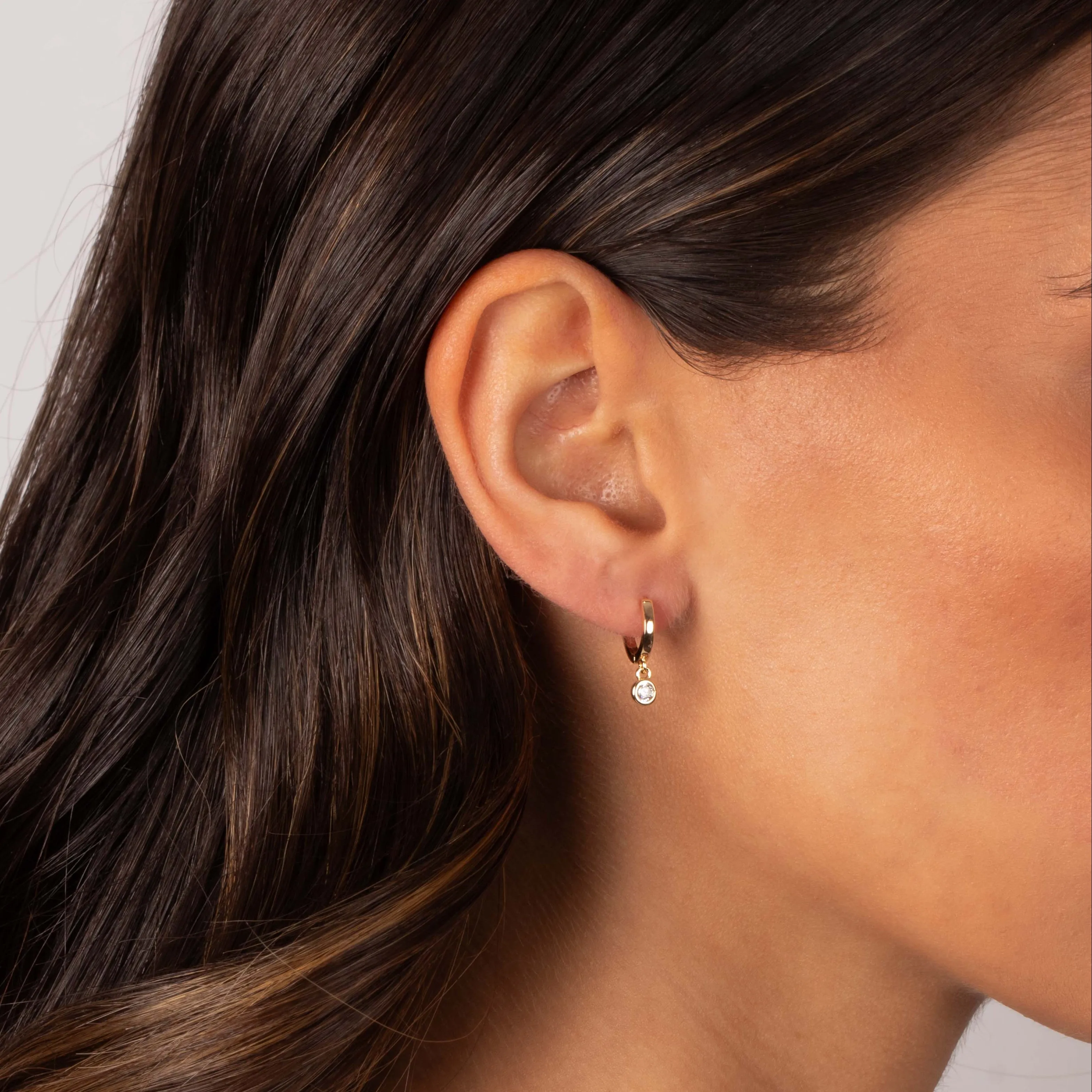 Dangling CZ Bezel Huggie Earring sold by Adina Eden's product image thumbnail 2