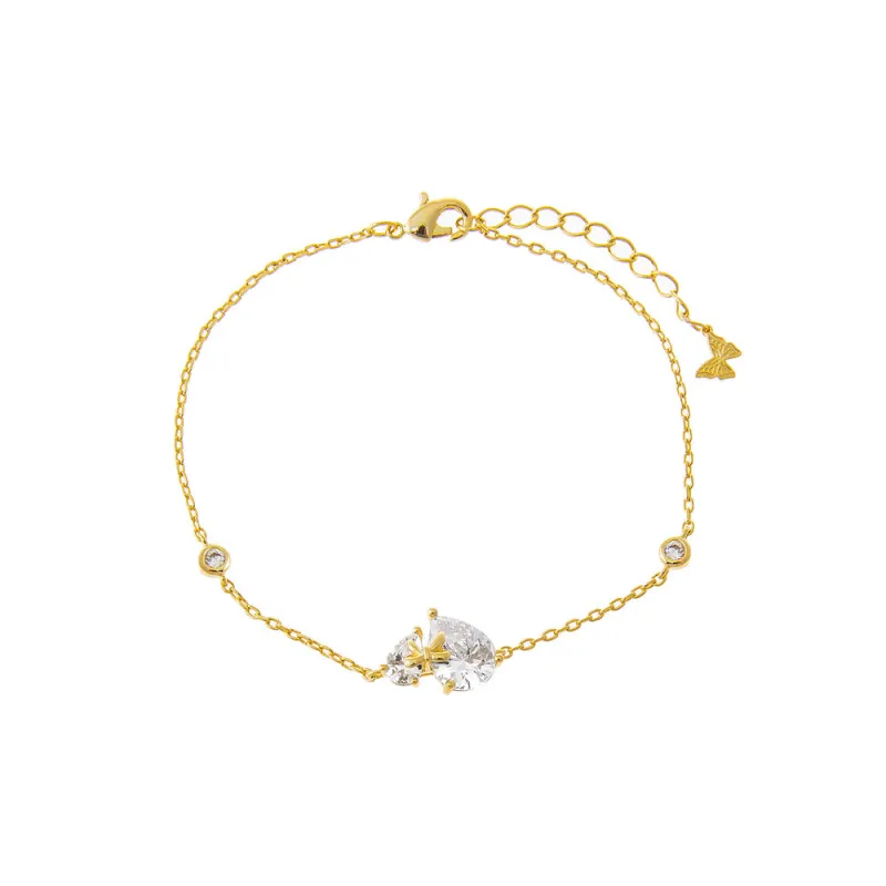 Double Teardrop W/ Bow Motif Charm Bracelet sold by Adina Eden's