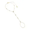 CZ Multi Shape Bezel Hand Chain Bracelet sold by Adina Eden's