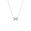 Pave X Baguette Mini Bow Tie Link Necklace sold by Adina Eden's