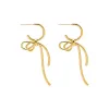 Solid Bow Tied Open Hoop Earring sold by Adina Eden's