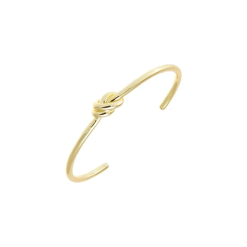 Solid Love Knot Cuff Bangle Bracelet sold by Adina Eden's
