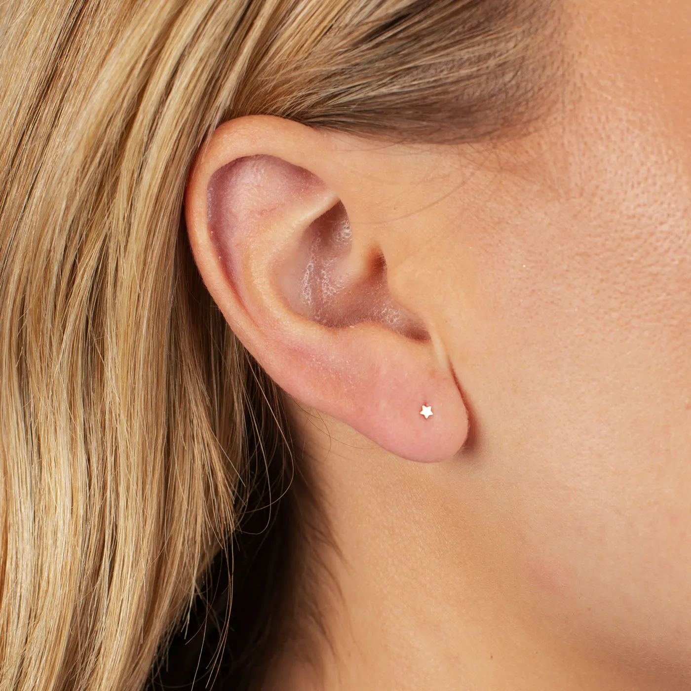 Itty Bitty Flat Star Threaded Stud Earring 14K sold by Adina Eden's product image thumbnail 2