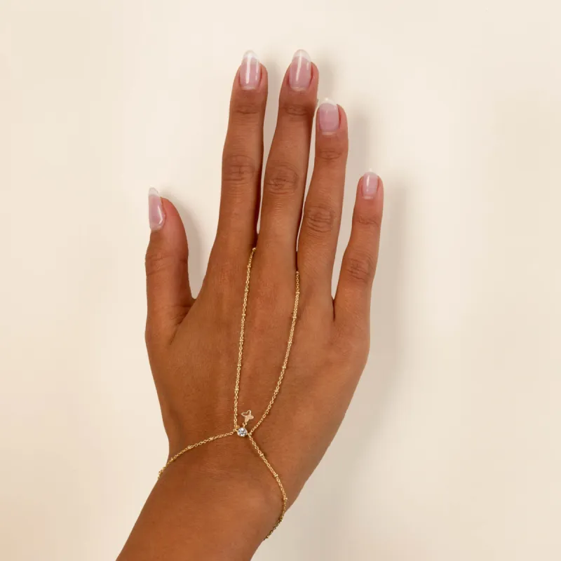 Dainty Butterfly x Bezel Hand Chain sold by Adina Eden's