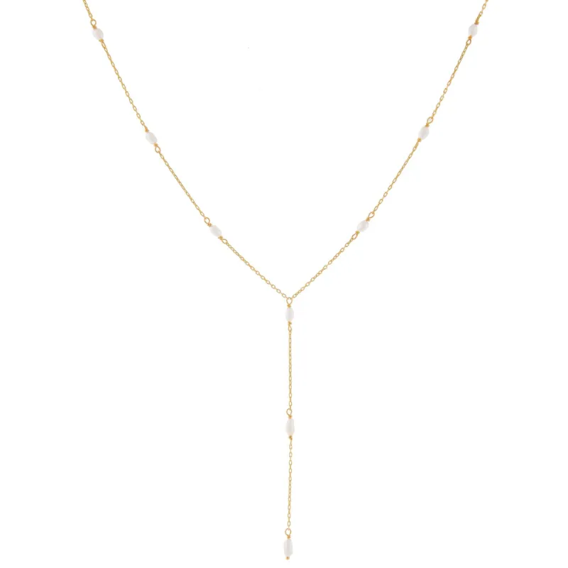 Dainty Pearl Lariat sold by Adina Eden's