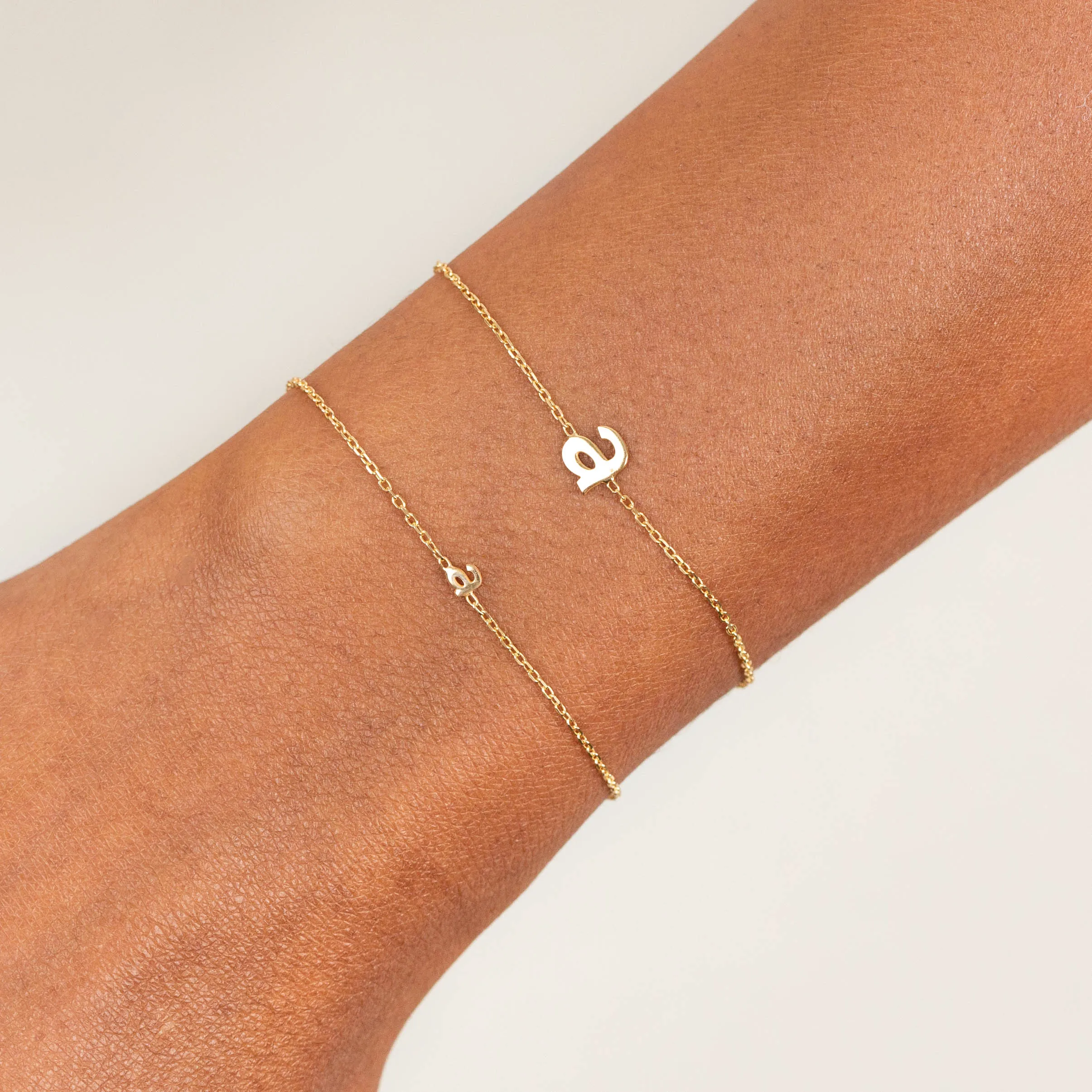 Tiny Solid Lowercase Initial Bracelet sold by Adina Eden's product image thumbnail 2
