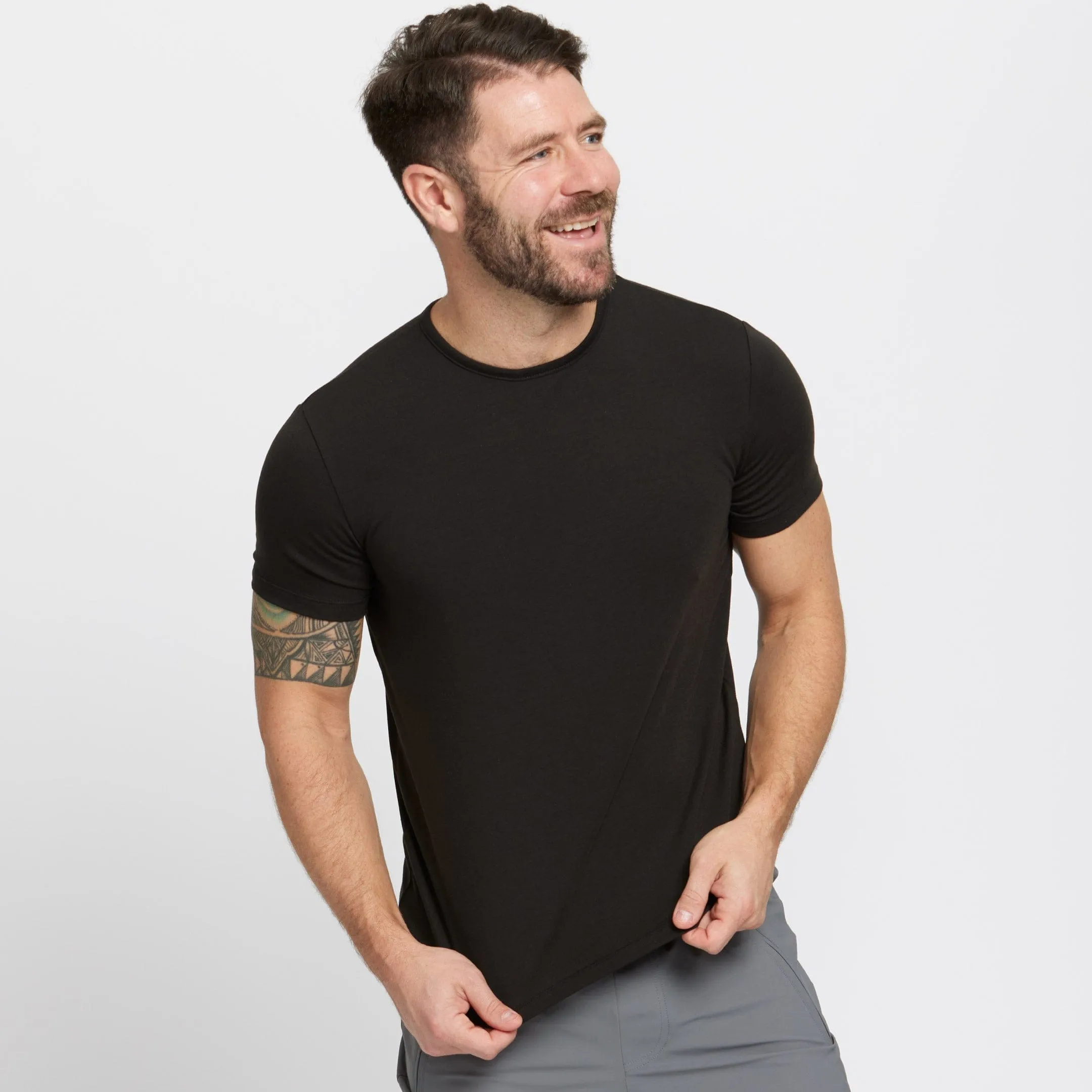 Black Hybrid Tee sold by Ash & Erie