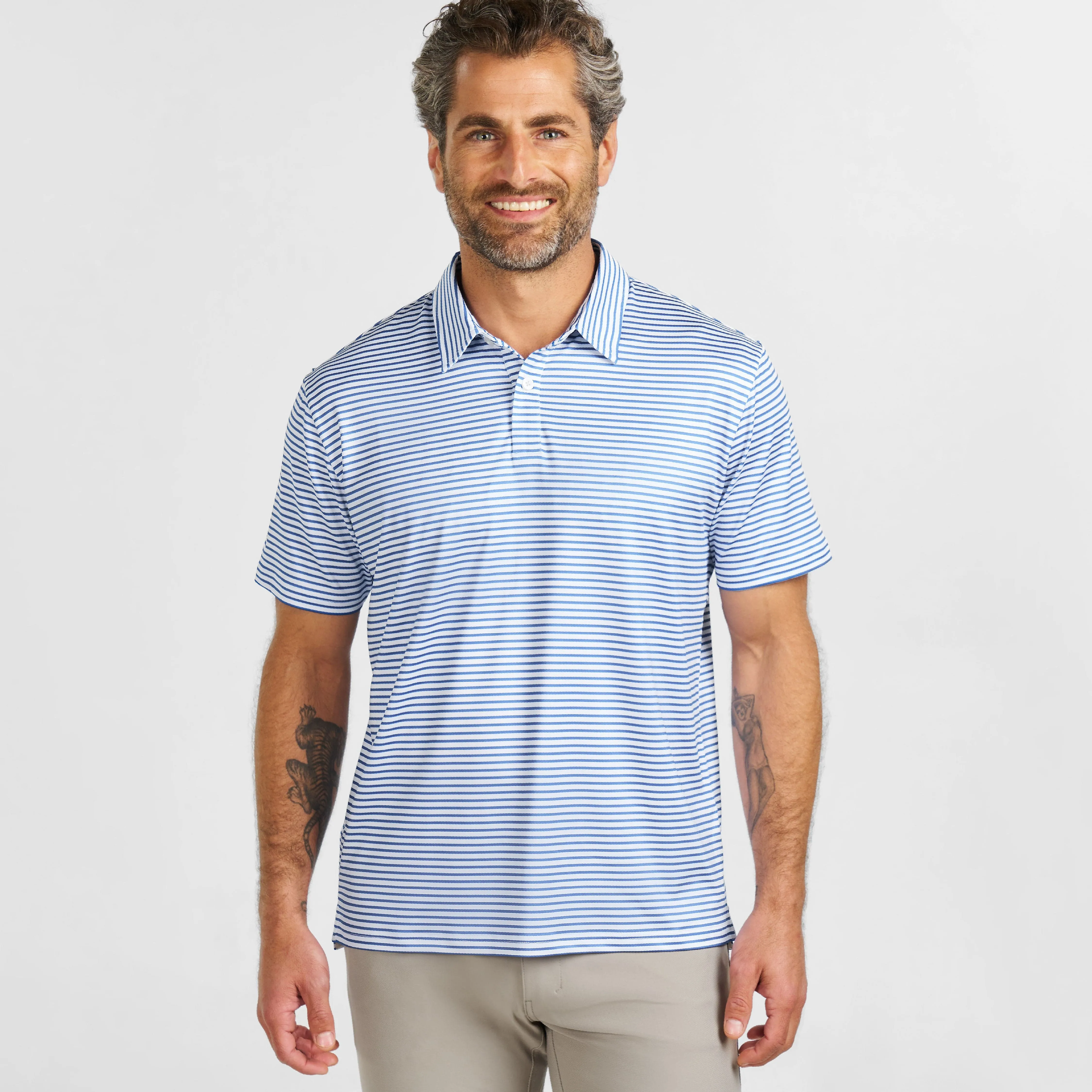 Coastal Stripes Tech Polo sold by Ash & Erie