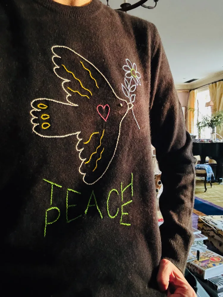 "Teach Peace" Crewneck sold by Lingua Franca NYC