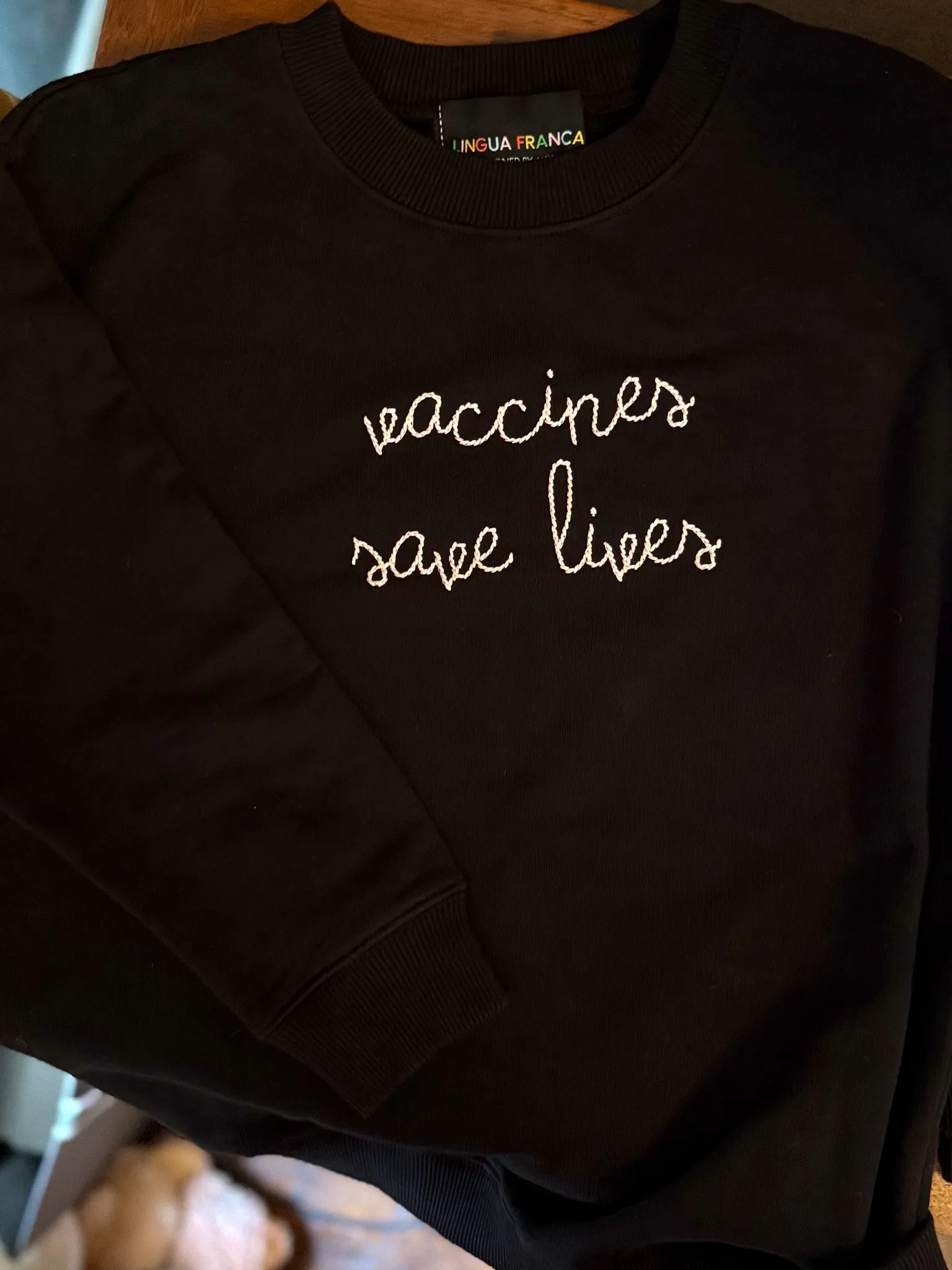 "vaccines save lives" Women's Sweatshirt sold by Lingua Franca NYC