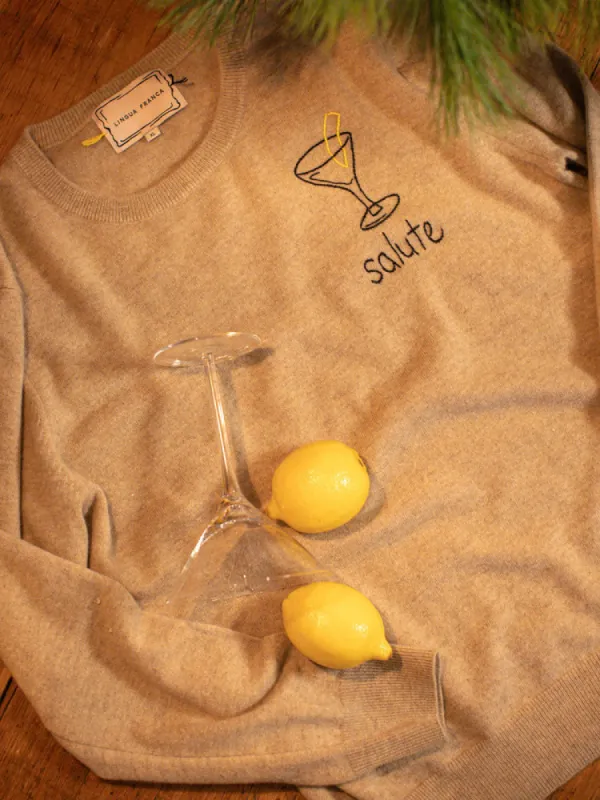 "salute" Martini Crewneck sold by Lingua Franca NYC
