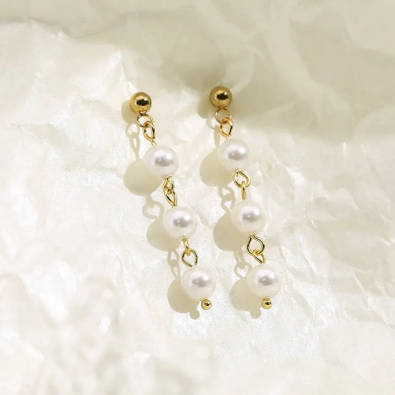 Pearl Chain Drop Earrings sold by Mason & Madison Co.
