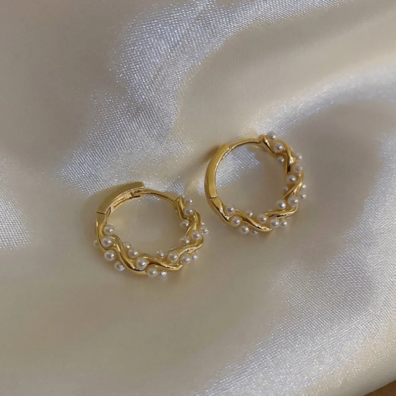 Twisted Gold & Pearl Huggie Hoop Earrings sold by Mason & Madison Co.