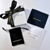 Twisted Gold & Pearl Huggie Hoop Earrings sold by Mason & Madison Co.