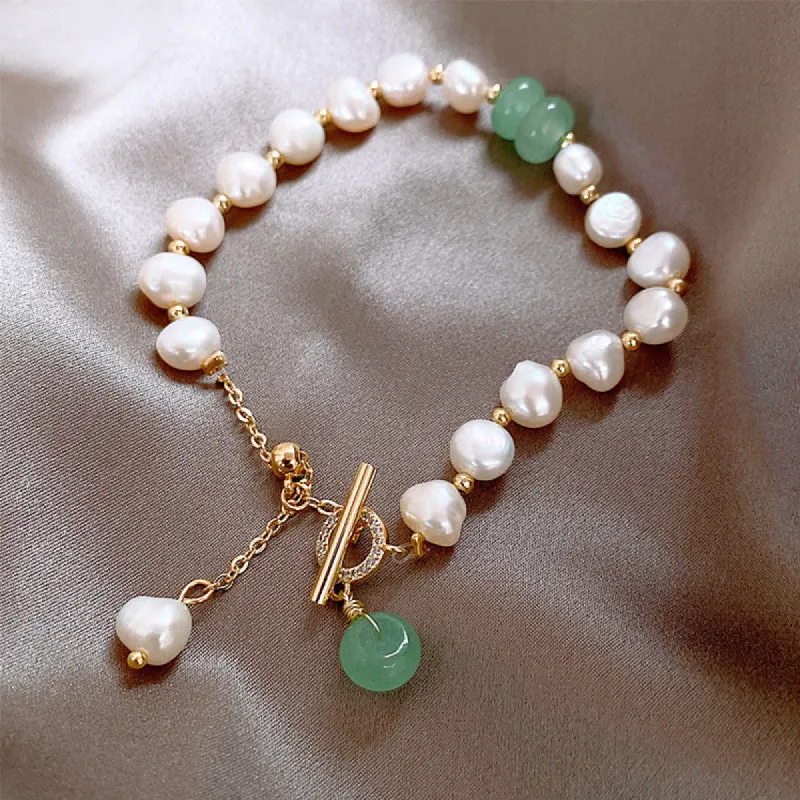 18K Pearl Bracelet With Jade Charm sold by Mason & Madison Co.