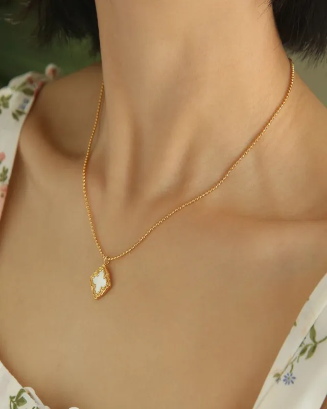 18K Shell Pendant Necklace sold by Mason & Madison Co.