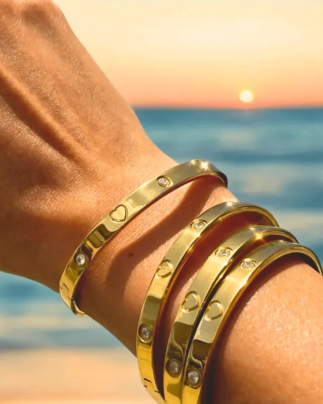 18K Gold Bangle Bracelet with Diamonds sold by Mason & Madison Co.