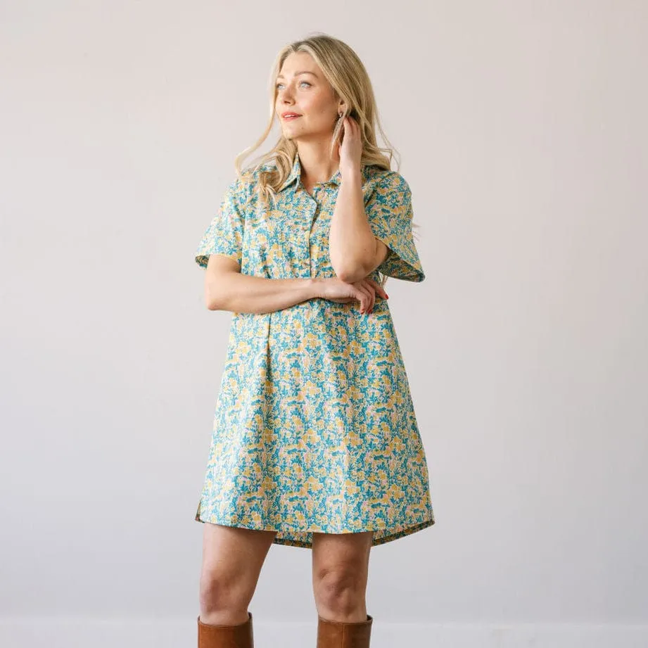 Paradise Floral Getaway Mini Dress sold by Sunshine Tienda