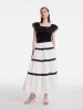 Ruffle Top And Tiered Maxi Skirt Two-Piece Set sold by Goelia