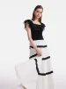 Ruffle Top And Tiered Maxi Skirt Two-Piece Set sold by Goelia