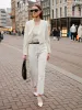 White Worsted Woolen Crop Blazer sold by Goelia
