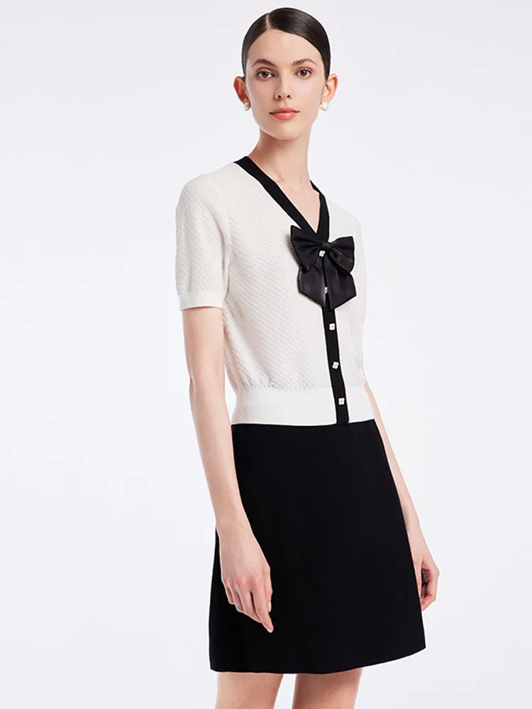 Woolen Knit Top And Women Skirt With Bowknot Two-Piece Set sold by Goelia
