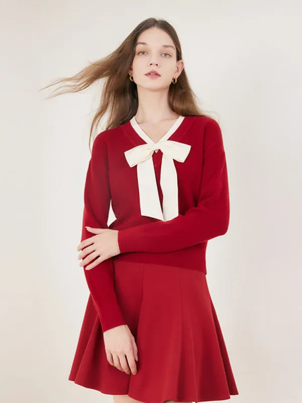 Red Bowknot Patchwork Woven Sweater sold by Goelia