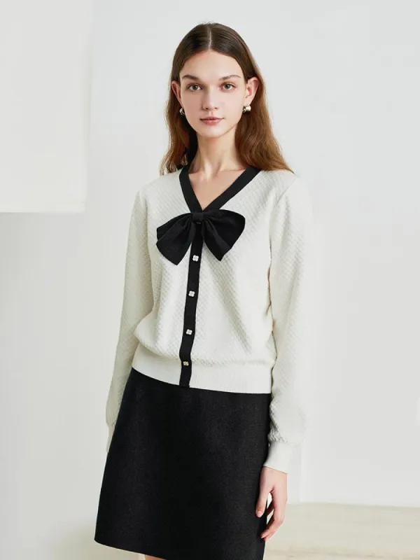 Bowknot Sweater And Mini Skirt Two-Piece Set sold by Goelia