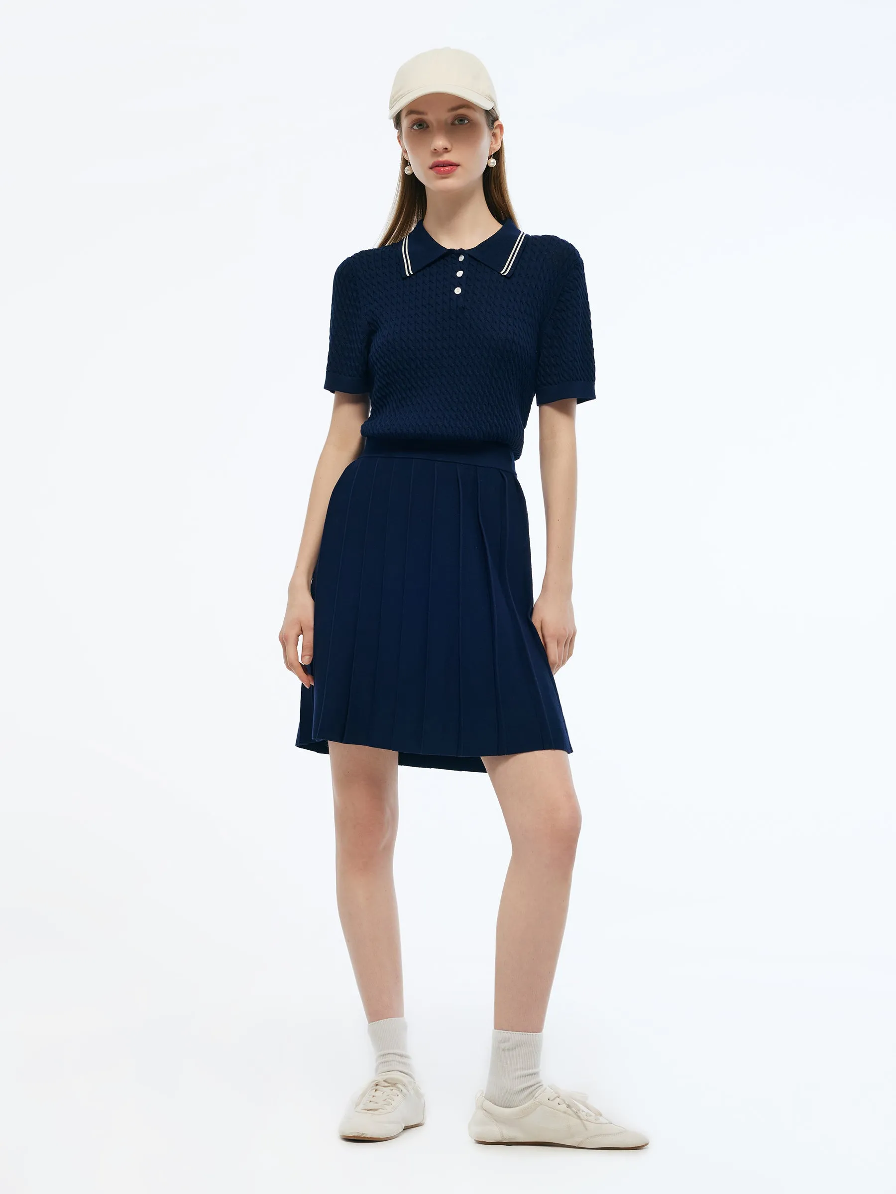 Lyocell Blend Polo Knit Top And Pleated Skirt Two-Piece Set sold by Goelia